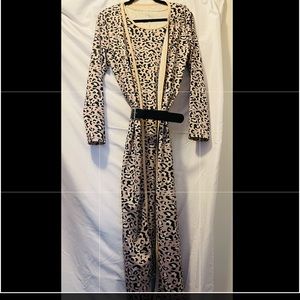 Beautiful 2-piece animal print midi dress with matching cardigan.